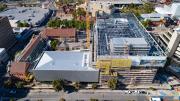 The steel super structure is complete and creates a large boxed space.